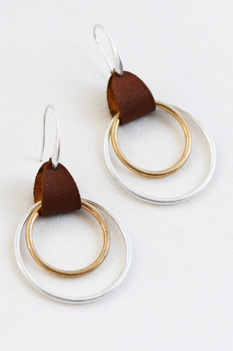 Oval drop 2-tone earring with Leather Accent