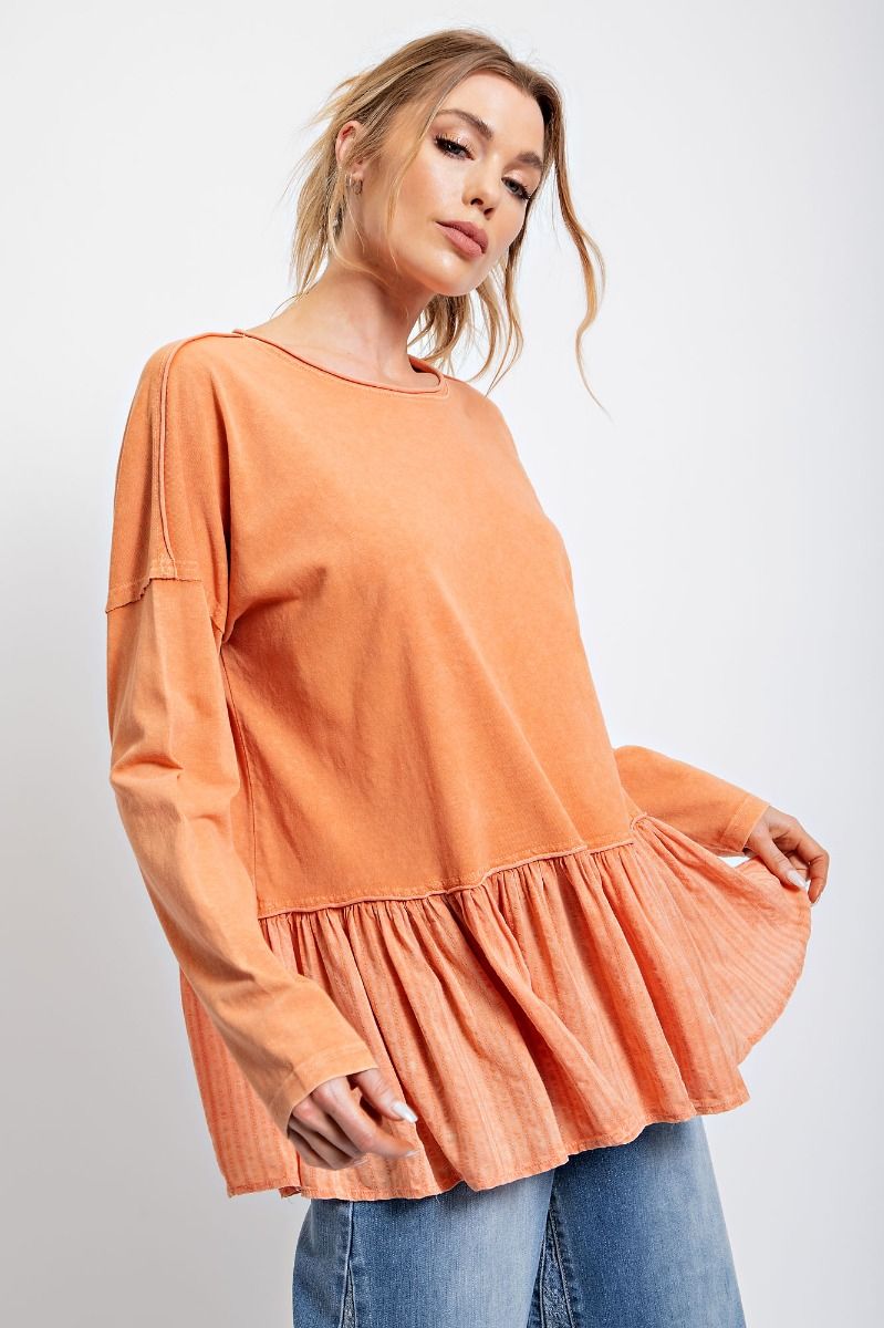 Faded orange peplum top