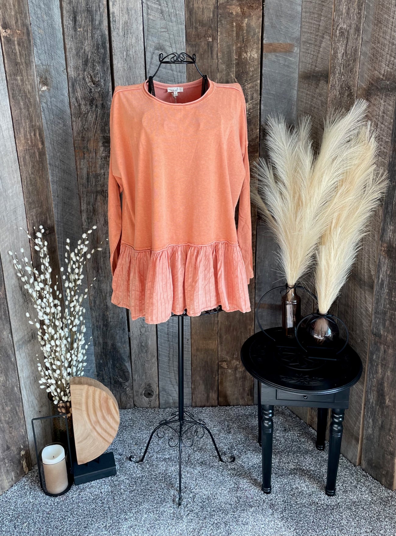 Faded orange peplum top