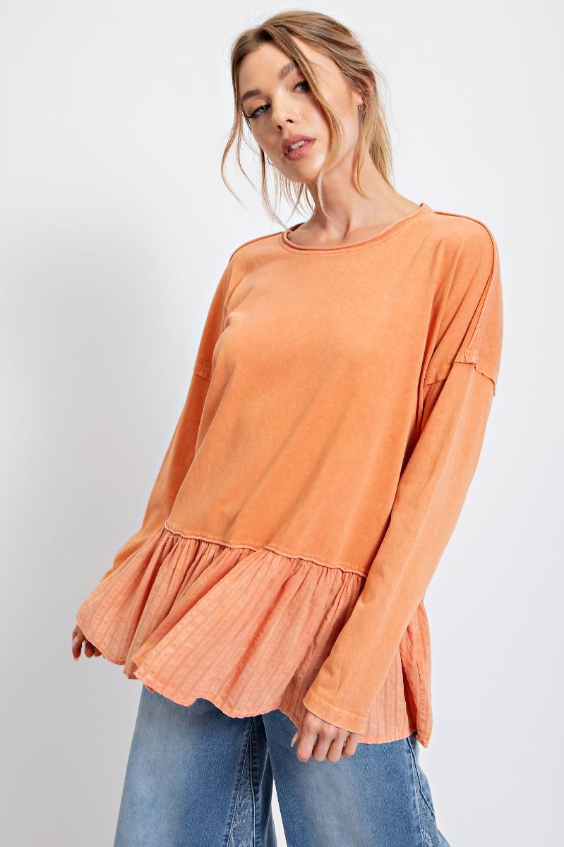 Faded orange peplum top