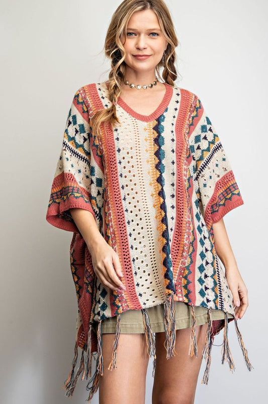 Poncho sweater with fringe