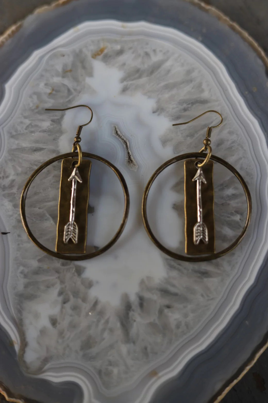 Antiqued gold hoop earrings with hammered bar and silver arrow