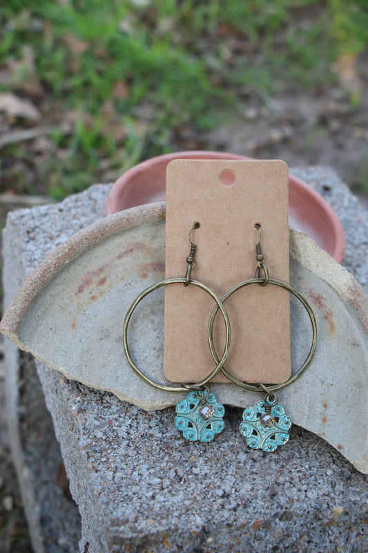 Antiqued gold hoops with patina flower