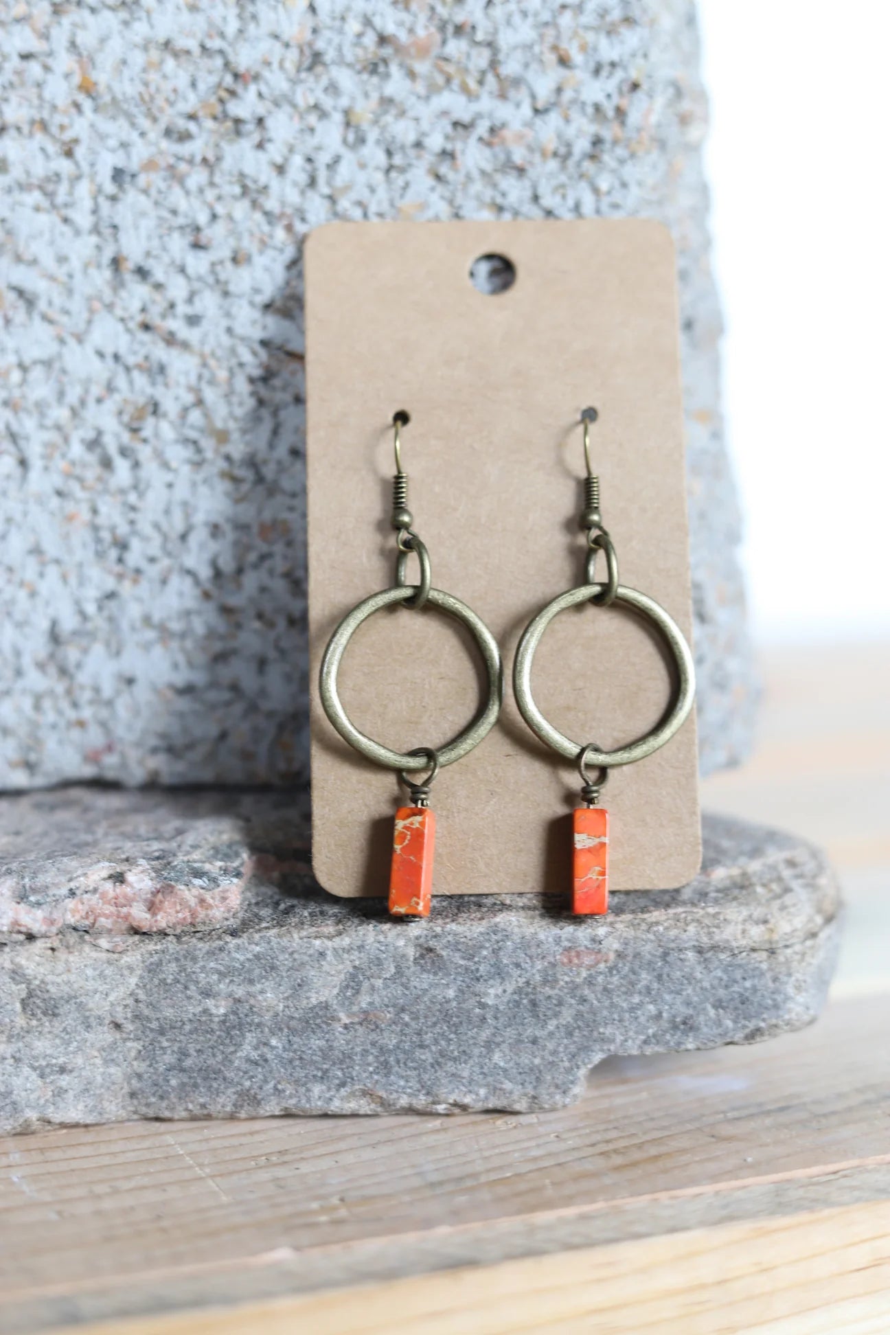 Bronze earrings with orange charm