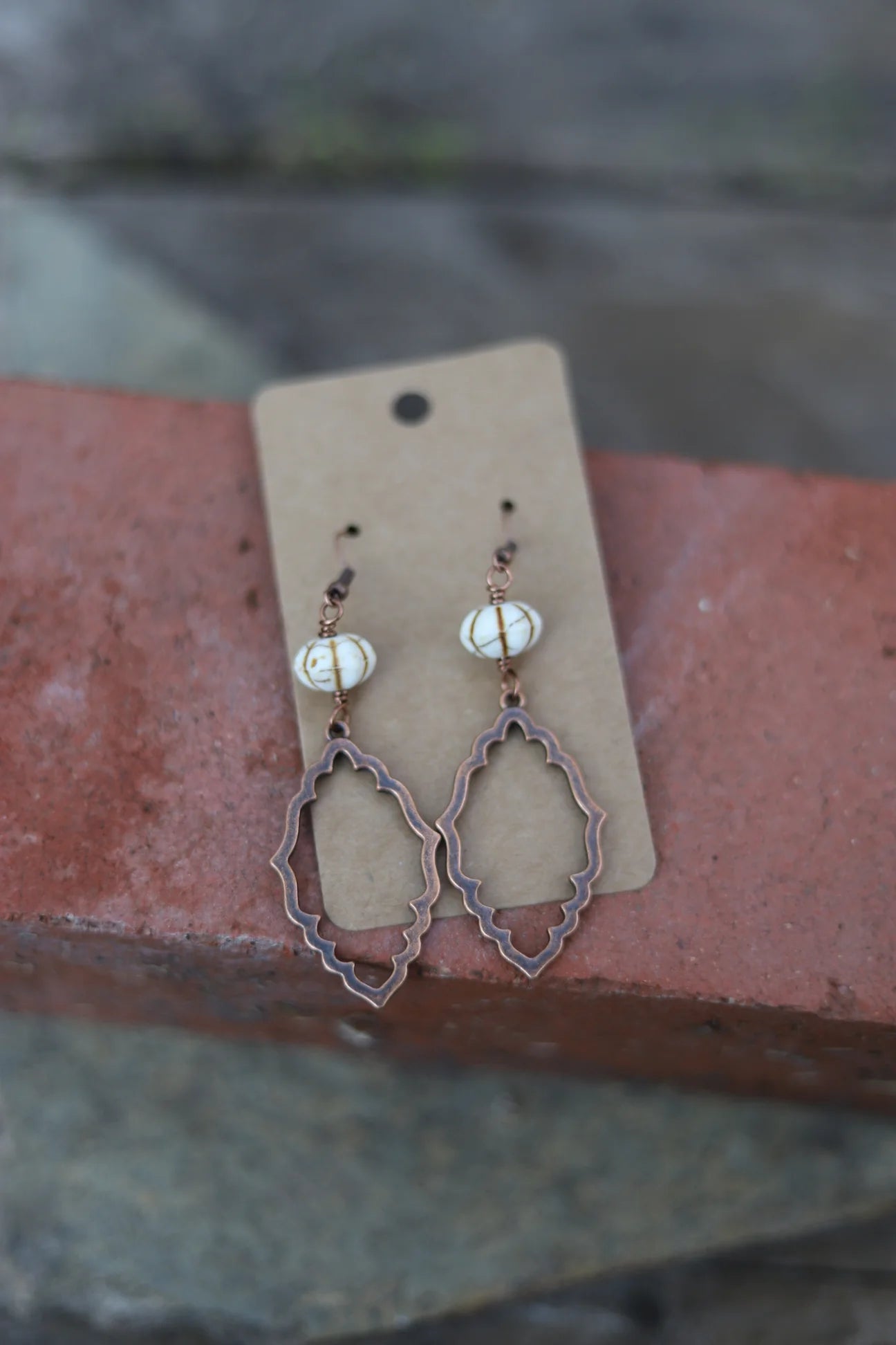 Bronze Teardrop earring with bone charm